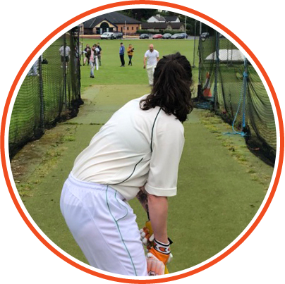woman playing cricket